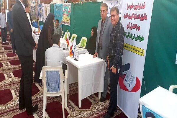 برپایی میز خدمت در مصلای نمازجمعه شهر برازجان
